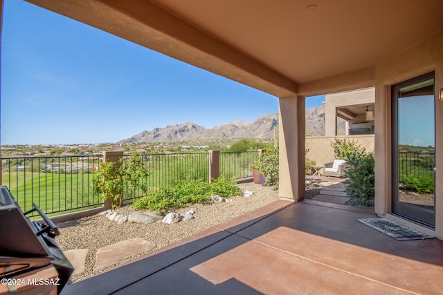 view of patio featuring a mountain view