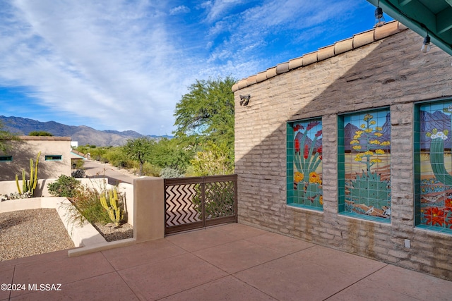 view of patio with a mountain view