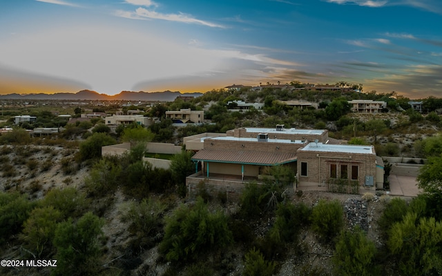 aerial view at dusk with a mountain view