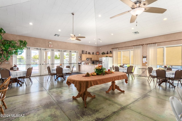 recreation room with concrete flooring, ceiling fan, and french doors