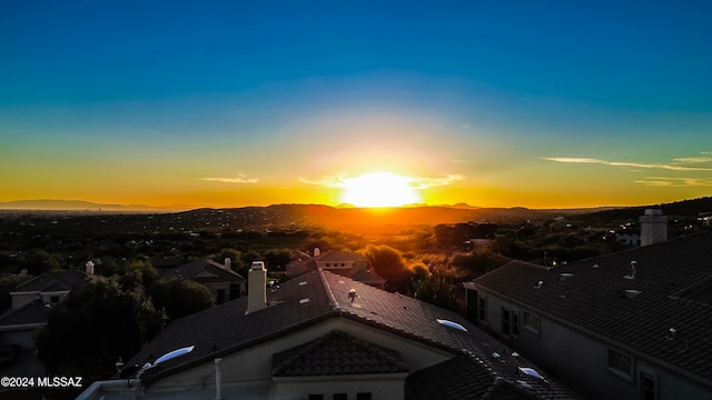 aerial view at dusk with a mountain view