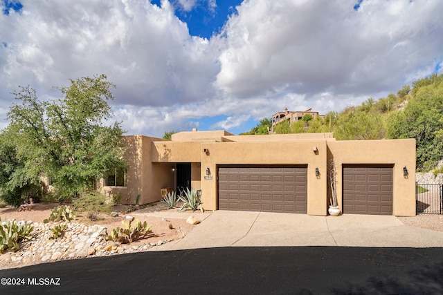 adobe home with a garage