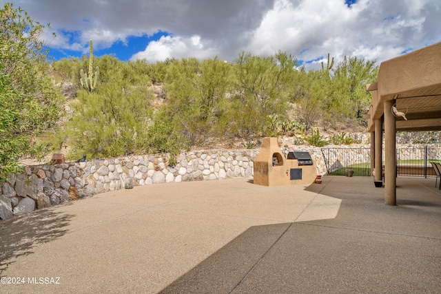 view of patio with an outdoor kitchen