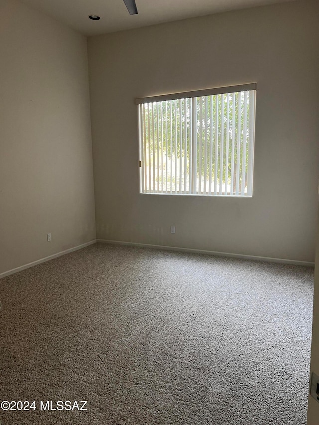 view of carpeted spare room