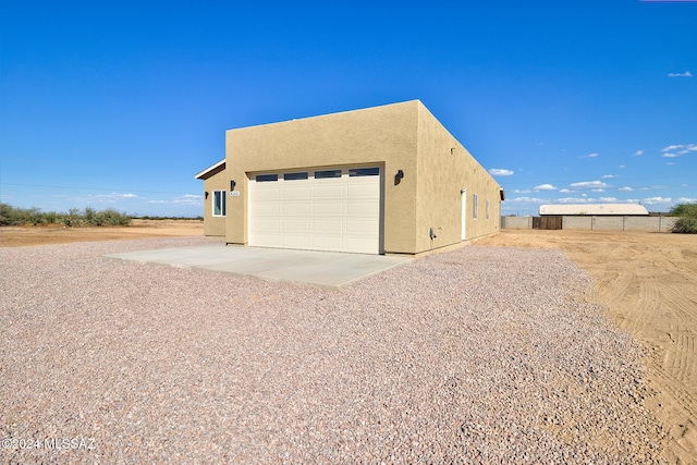 exterior space featuring a garage