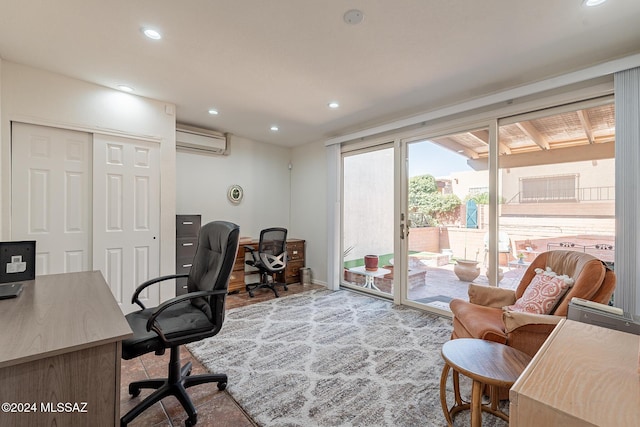 office space with recessed lighting, baseboards, and a wall unit AC