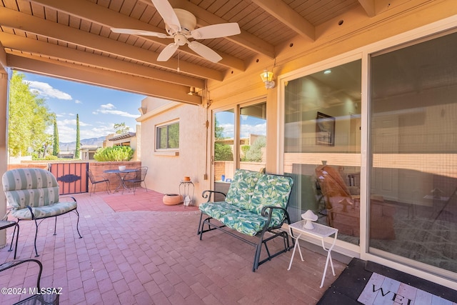 view of patio / terrace featuring ceiling fan