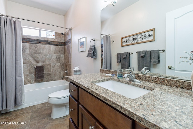 full bathroom featuring toilet, vanity, and shower / bath combination with curtain