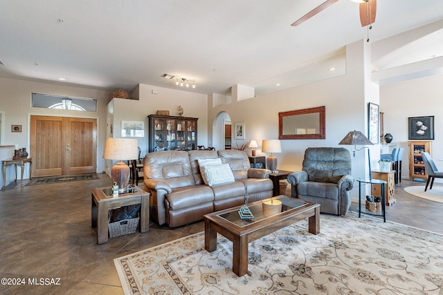 living room featuring ceiling fan