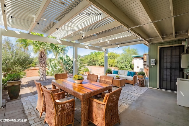 view of patio / terrace with a pergola and outdoor lounge area