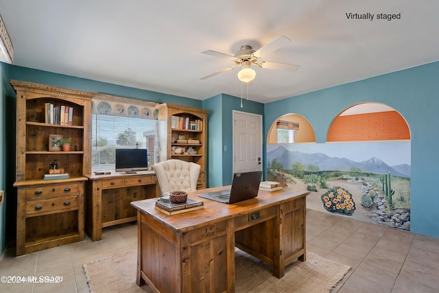 office with ceiling fan and light tile patterned floors