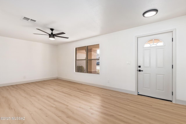 foyer featuring ceiling fan and light hardwood / wood-style flooring