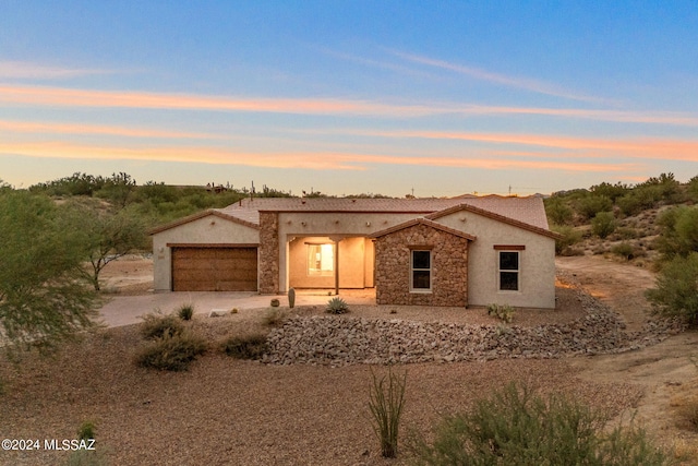 view of front of property featuring a garage