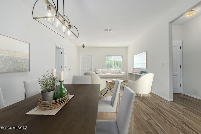 dining room featuring hardwood / wood-style floors