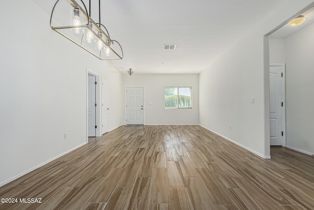 interior space with hardwood / wood-style flooring