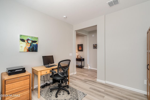 home office featuring light wood-type flooring