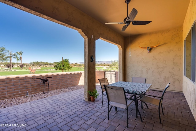 view of patio with ceiling fan