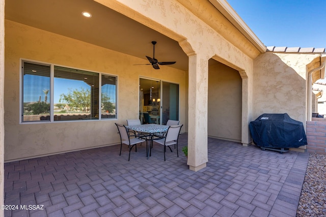 view of patio / terrace featuring ceiling fan and area for grilling