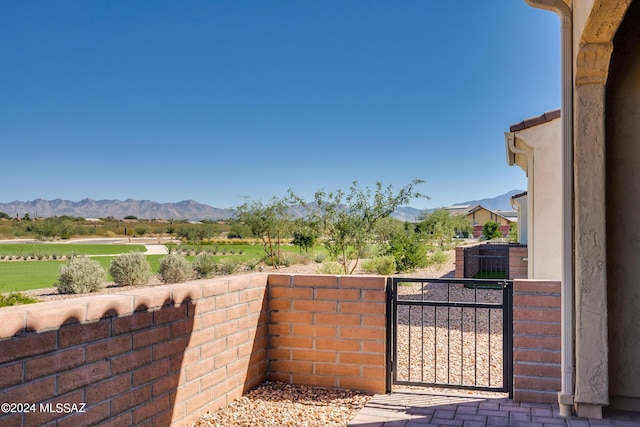 view of patio / terrace featuring a mountain view