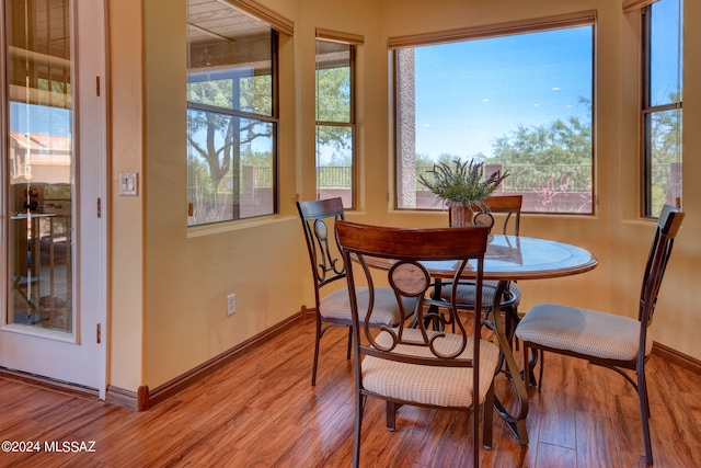 dining room with light wood-type flooring