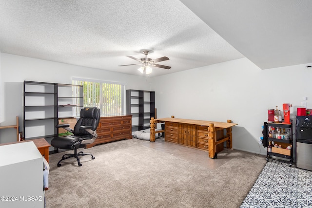 office with carpet, a textured ceiling, and ceiling fan