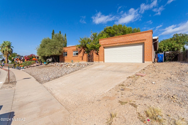 view of front of property featuring a garage