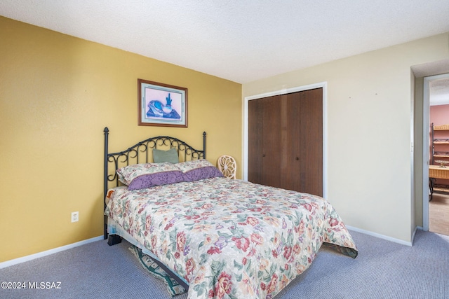 carpeted bedroom featuring a closet