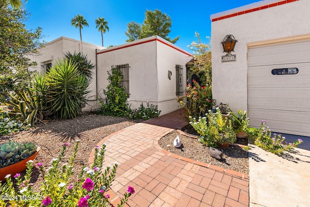 view of patio featuring a garage