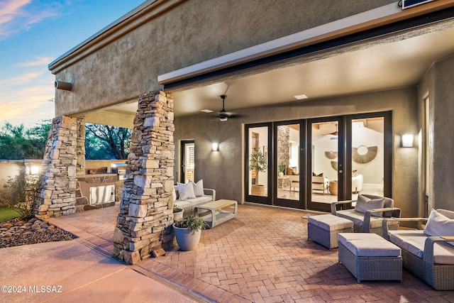 patio terrace at dusk with ceiling fan