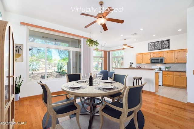 dining area featuring recessed lighting, light wood finished floors, and ceiling fan