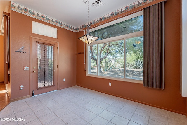 entryway featuring light tile patterned floors