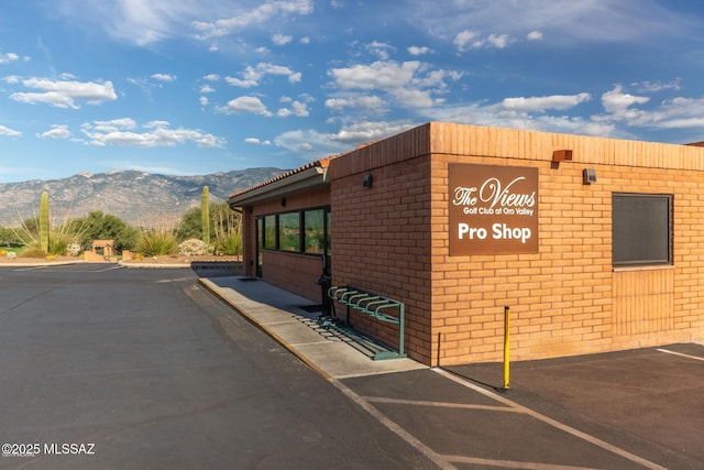 view of building exterior with a mountain view