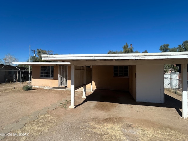 view of front of house featuring a carport