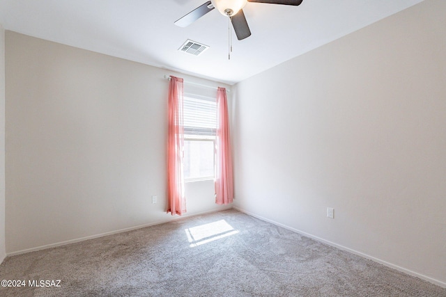 carpeted empty room with ceiling fan