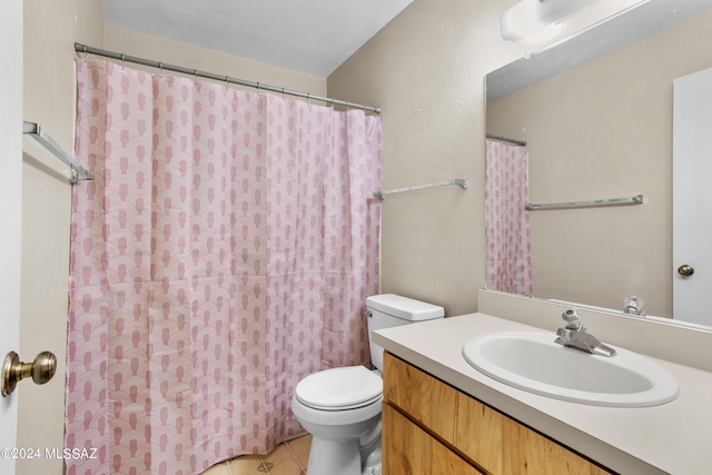 bathroom featuring vanity, a shower with curtain, toilet, and tile patterned floors