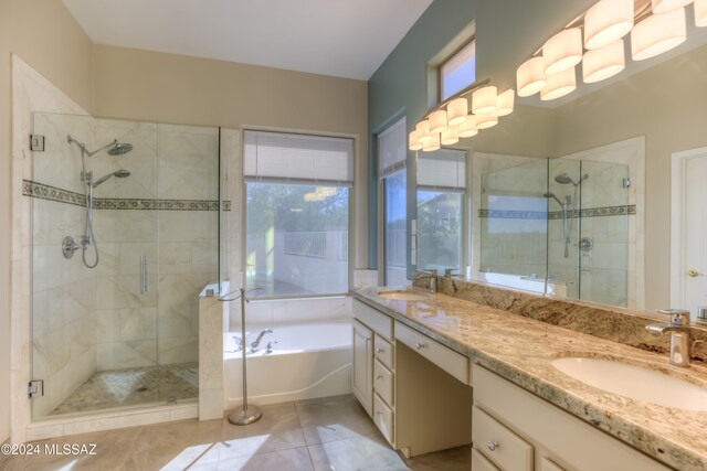 bathroom with vanity, tile patterned floors, and separate shower and tub