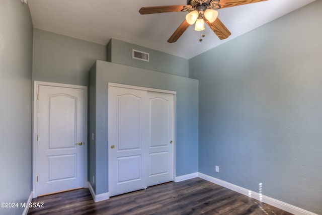 unfurnished bedroom with a closet, ceiling fan, and dark hardwood / wood-style floors