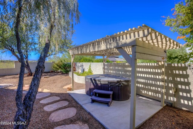 view of patio featuring a hot tub