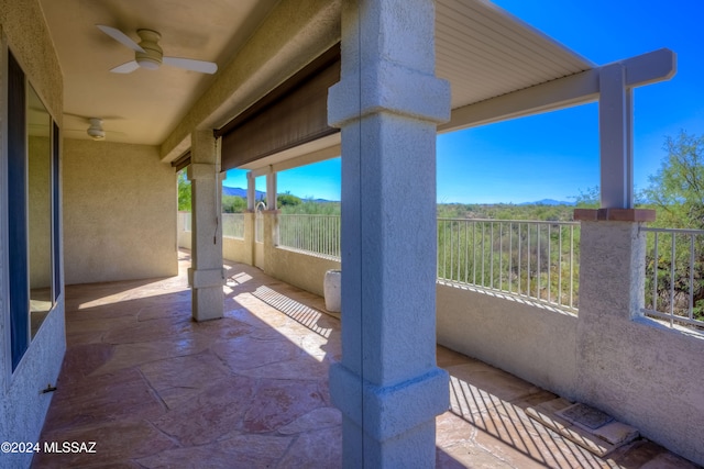 view of patio / terrace featuring ceiling fan