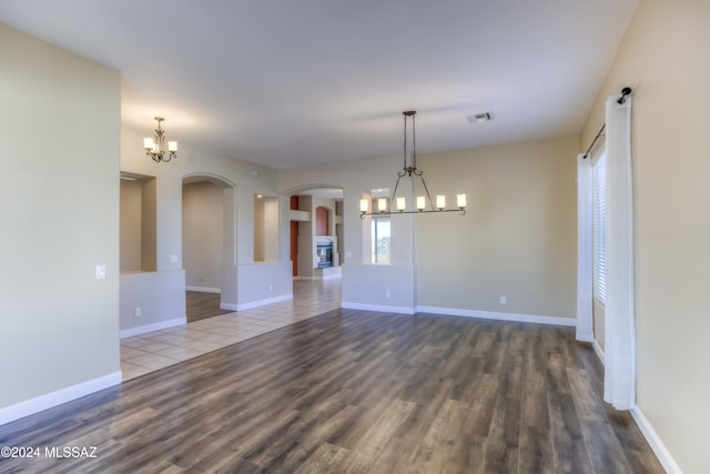 unfurnished room featuring wood-type flooring