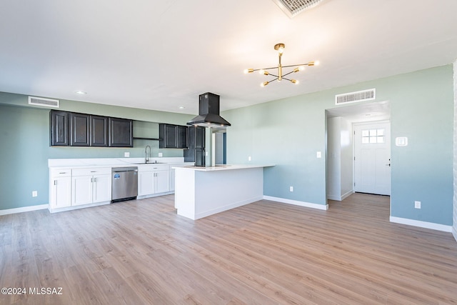 kitchen featuring white cabinetry, island range hood, dishwasher, light hardwood / wood-style floors, and sink