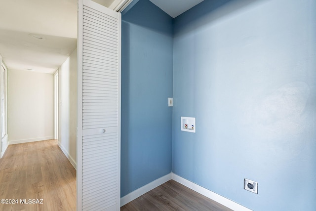 washroom featuring electric dryer hookup, washer hookup, and hardwood / wood-style floors