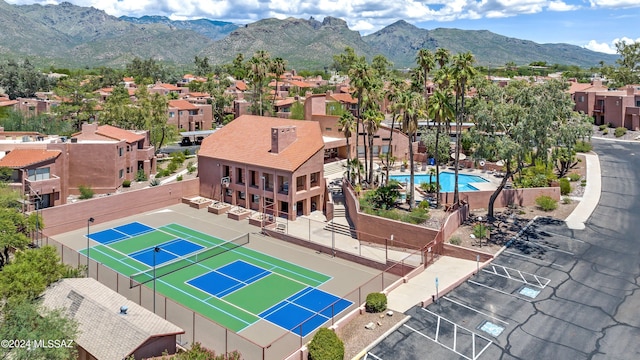 birds eye view of property featuring a mountain view and a residential view