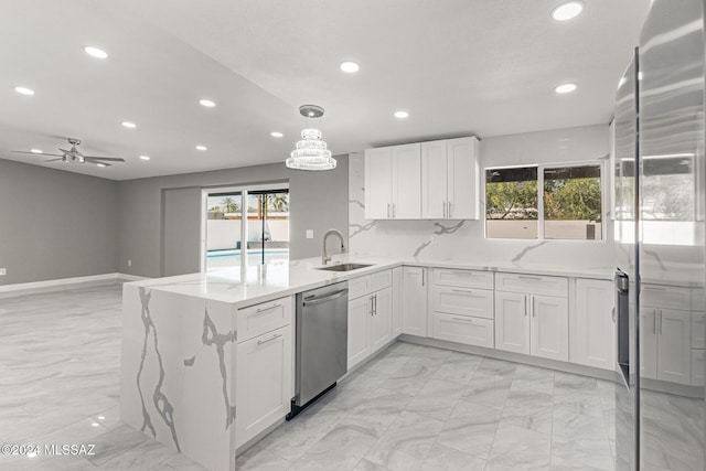 kitchen with white cabinetry, a healthy amount of sunlight, dishwasher, and sink