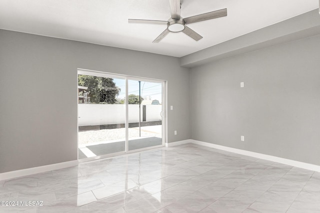 spare room featuring ceiling fan