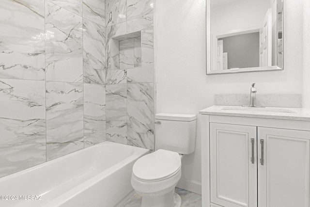 full bathroom with vanity, toilet, and tiled shower / bath combo