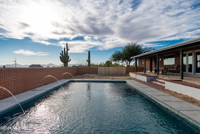 view of pool featuring a patio and pool water feature