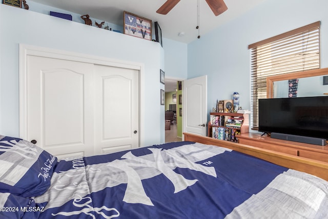 bedroom featuring a closet and ceiling fan