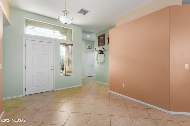 entrance foyer featuring light tile patterned floors