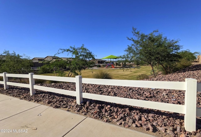 view of side of property featuring a playground